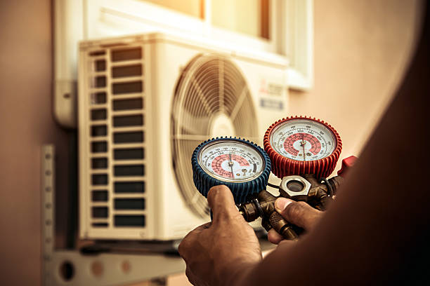 Professional Hvac technician working in Springville, IN